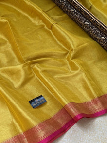 LEMON YELLOW SOFT TISSUE SAREE COMES WITH PINK BORDER
