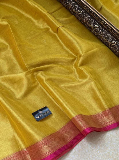 LEMON YELLOW SOFT TISSUE SAREE COMES WITH PINK BORDER