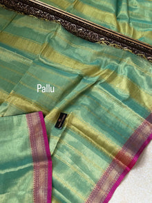 TURQUOISE GREEN SOFT TISSUE SAREE COMES WITH PINK BORDER