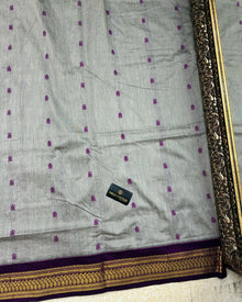 GREY COTTON SILK SAREE WITH WINE BORDER.