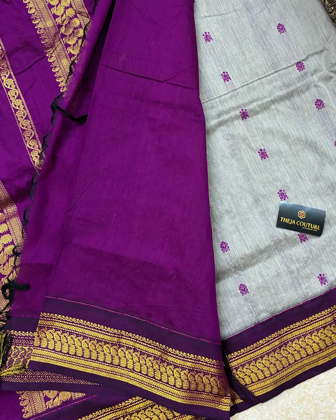 GREY COTTON SILK SAREE WITH WINE BORDER.