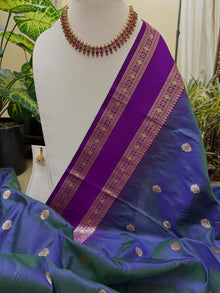 PEACOCK GREEN ART SILK SAREE WITH PURPLE BORDER