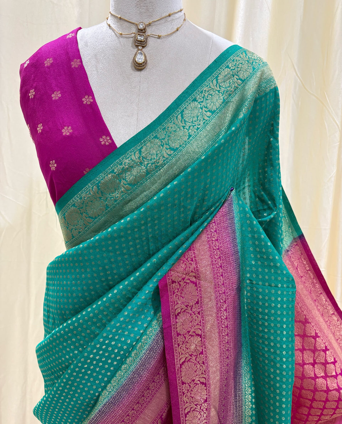 Teal blue chiffon saree with pink saree.