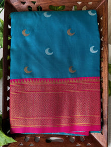 TEAL BLUE CHANDRAKOR ART SILK WITH RANI PINK BORDER
