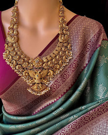 BOTTLE GREEN ART SILK SAREE WITH MAGENTA GOLD ZARI BORDER