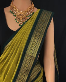 PEAR GREEN COTTON SILK SAREE WITH GREEN BORDER.