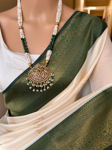 WHITE ART SILK SAREE WITH CONTRAST GREEN BORDER