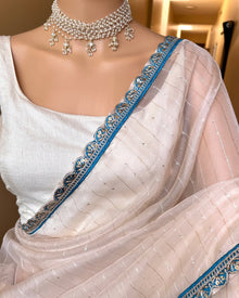 WHITE JUTE SILK SAREE WITH SKY BLUE LACE