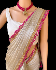 SILVER METALLIC TISSUE SAREE WITH PINK LACE