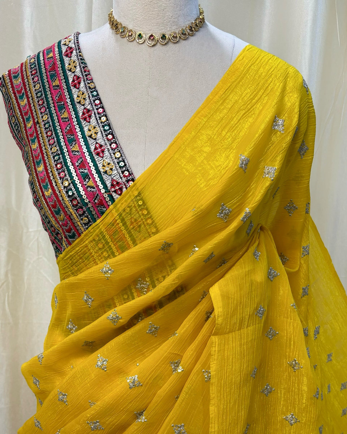 Yellow sequence georgette saree comes with Multi color embroidery blouse .