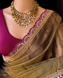 GOLDEN BLACK TISSUE SAREE WITH MAGENTA LACE