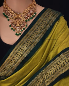 PEAR GREEN COTTON SILK SAREE WITH GREEN BORDER.