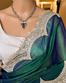 PEACOCK GREEN METTALIC TISSUE SAREE