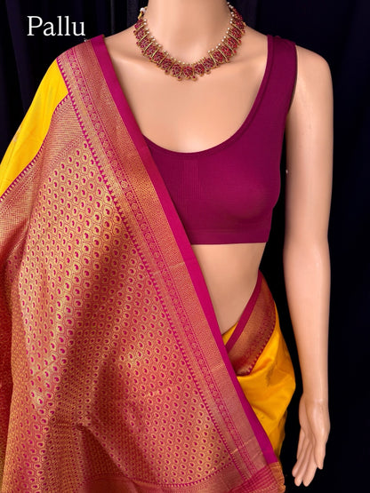 YELLOW SOFT ART SILK SAREE WITH CONTRAST RANI PINK ZARI WEAVE BORDER