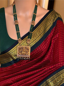 REDDISH MARRON CHECKS COTTON SILK SAREE COMES WITH GREEN BORDER