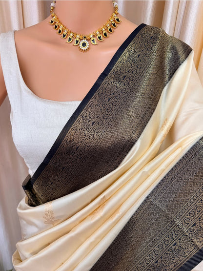 OFF WHITE ART SILK SAREE COMES WITH CONTRAST ZARI WEAVE BORDER