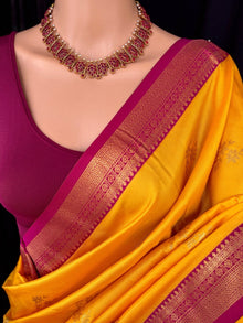YELLOW SOFT ART SILK SAREE WITH CONTRAST RANI PINK ZARI WEAVE BORDER