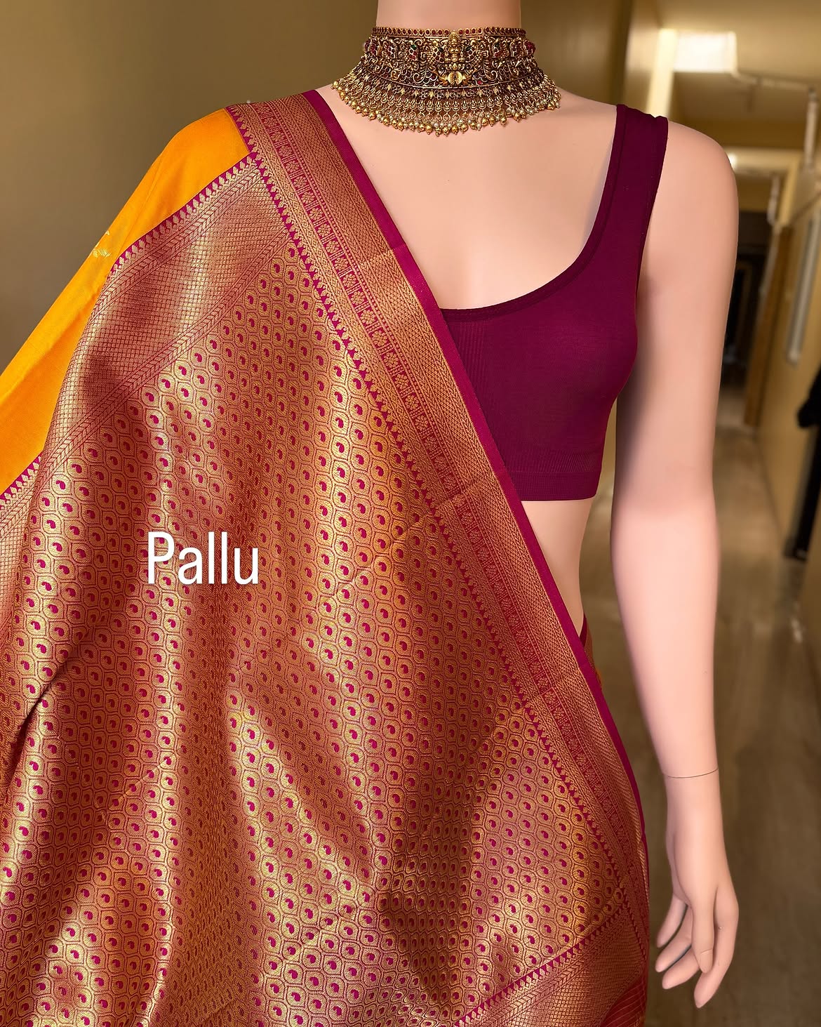 Mango yellow art silk saree with magenta pink border.