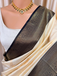 OFF WHITE ART SILK SAREE COMES WITH CONTRAST ZARI WEAVE BORDER