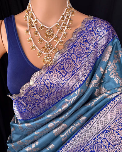 TEAL BLUE SEMI ART SILK SAREE COMES WITH GOLDES SILVER ZARI WEAVE ALL OVER SAREE