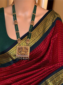 REDDISH MARRON CHECKS COTTON SILK SAREE COMES WITH GREEN BORDER
