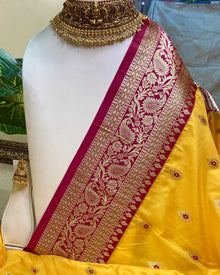 YELLOW ART SILK SAREE WITH PINK BORDER