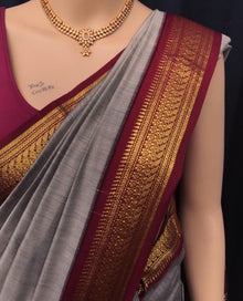 ASH COTTON SILK SAREE WITH PEACOCK BORDER.