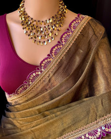 GOLDEN BLACK TISSUE SAREE WITH MAGENTA LACE